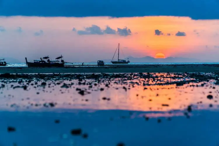 Beautiful sunrise at Loh Ba Kao Bay, Koh Phi Phi by phiphiphotography.com
